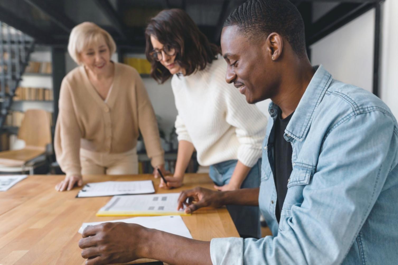 Professional team discussing financial strategies in modern office setting